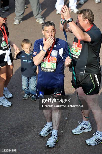 Pc David Rathband completes the 2011 Virgin London Marathon on April 17, 2011 in London, England.