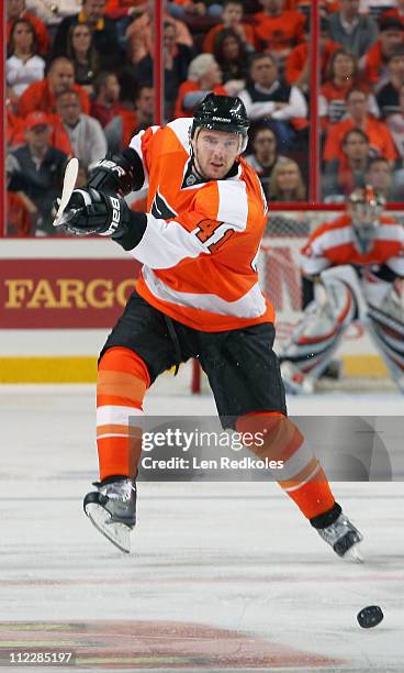 Andrej Meszaros of the Philadelphia Flyers shoots the puck against the Buffalo Sabres in Game One of the Eastern Conference Quarterfinals during the...