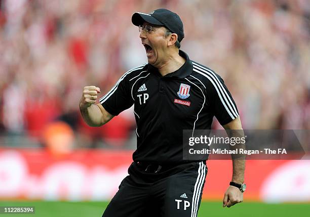 Tony Pulis, manager of Stoke celebrates the fifth goal during the FA Cup sponsored by E.ON semi final match between Bolton Wanderers and Stoke City...