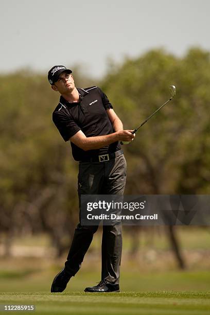 Brendan Steele follows through on an approach shot during the final round of the Valero Texas Open at the AT&T Oaks Course at TPC San Antonio on...