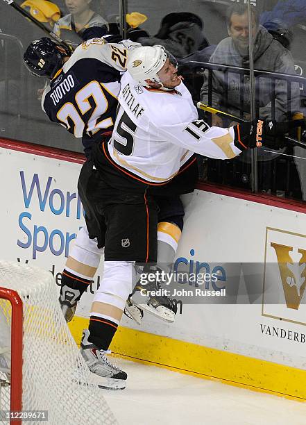 Ryan Getzlaf of the of the Anaheim Ducks checks Jordin Tootoo of the Nashville Predators in Game Three of the Western Conference Quarterfinals during...