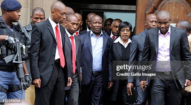 President Julius Malema and ANC stalwart Winnie Madikizela Mandela leave the Johannesburg high court on April 15, 2011 in Johannesburg, South Africa....