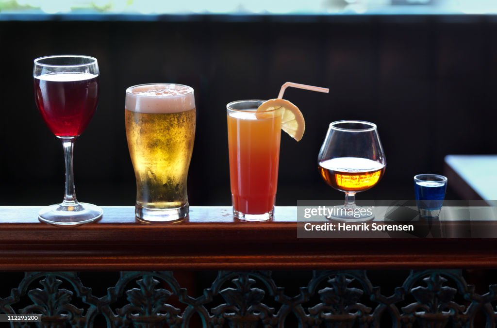 Row of assorted drinks in a bar