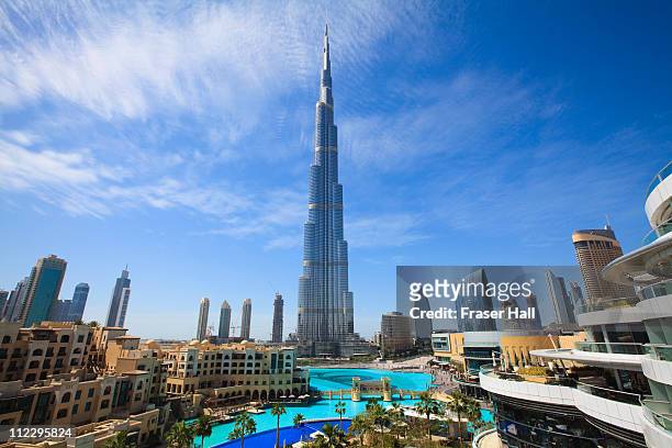 cityscape with burj khalifa, dubai - dubai stock-fotos und bilder