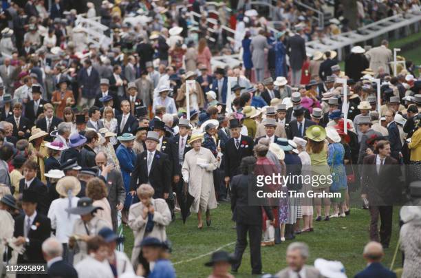 Queen Elizabeth II walking through the crowds at the Royal Ascot race meeting, at Ascot racecourse in Ascot, Berkshire, England, Great Britain, June...
