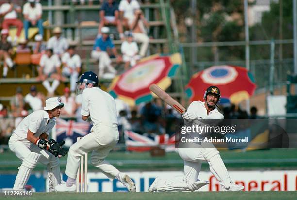 Australian cricketer Rod Marsh sweeps a ball from England bowler Geoff Miller during the Second Test in the Ashes series at Brisbane Cricket Ground,...