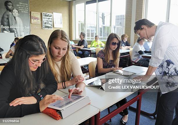 Students of the Hondsrug college use iPads during an English class in Emmen on April 18, 2011. After summer holidays, every class of Hondsrug college...