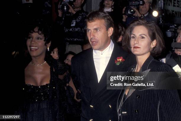 Singer Whitney Houston, actor Kevin Costner and wife Cindy Costner attend "The Bodyguard" Hollywood Premiere on November 23, 1992 at Mann's Chinese...