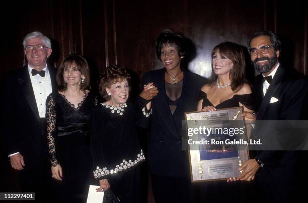 Talk show host Phil Donahue, Terre Thomas, Rose Marie Mantell, singer Whitney Houston, actress Marlo Thomas and producer Tony Thomas attend the 13th...