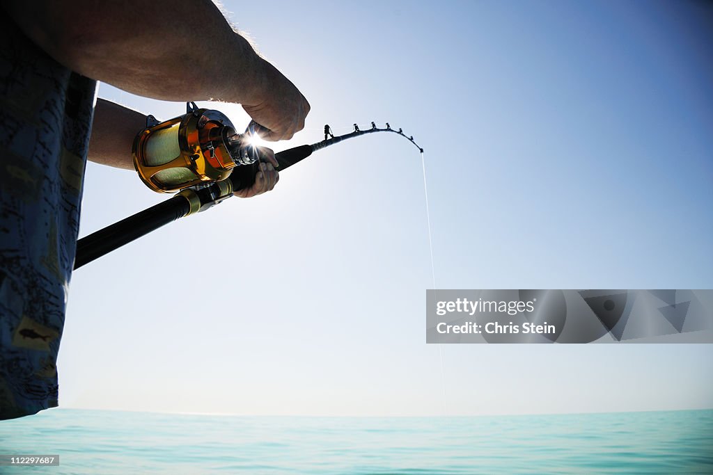 Man fishing on the open water