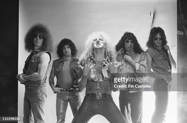 Twisted Sister posed in the studio for the LP cover session of 'Under The Blade' in London in July 1982. Left to Right: Mark Mendoza, AJ Pero, Dee...