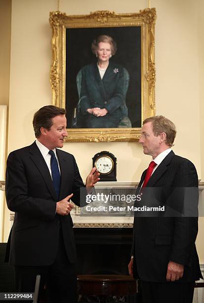 Taoiseach Enda Kenny meets with Prime Minister David Cameron under a portrait of former Prime Minister Margaret Thatcher at 10 Downing Street on...