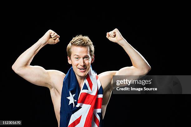 man with australian flag cheering - semi dress stock pictures, royalty-free photos & images