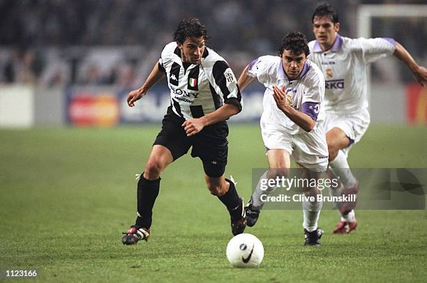 Alessandro del Piero of Juventus shadows Manuel Sanchis of Real Madrid during the Champions League final at the Amsterdam Arena in Holland. Real...
