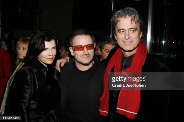 Ali Hewson, musician Bono and Bobby Shriver attend The Auction to raise money to fight AIDS in Africa at Sotheby's on February 14, 2008 in New York...