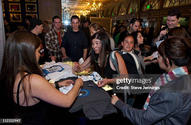 Guests claim their prizes at the product booth at the Samsung AT&T Summer Krush concert at The Warfield Theater on July 31, 2009 in San Francisco,...
