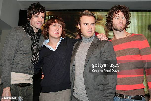 Jason Orange, Mark Owen, Gary Barlow and Howard Donald of Take That