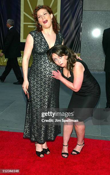 Rachel Dratch listens to Ana Gasteyer's stomach during NBC 75th Anniversary at Rockefeller Plaza in New York City, New York, United States.