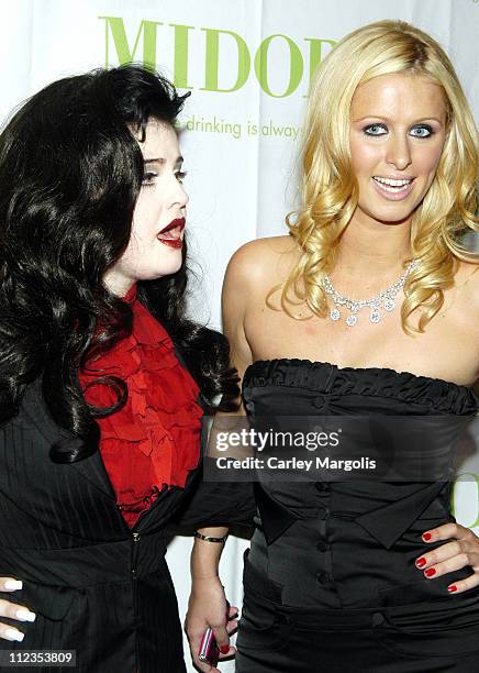 Kelly Osbourne and Nicky Hilton during Olympus Fashion Week Spring 2006 - Heatherette - Backstage at Bryant Park in New York City, New York, United...