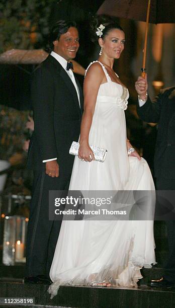 Arun Nayer and Elizabeth Hurley during Elton John's 60th Birthday Party at St John the Divine Church in New York City, New York, United States.