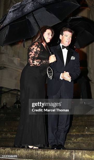 Keely Shaye Smith and Pierce Brosnan during Elton John's 60th Birthday Party at St John the Divine Church in New York City, New York, United States.