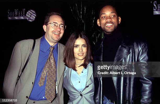 Barry Sonnenfeld, Salma Hayek & Will Smith during 25th Annual NATO/ShoWest Convention - 1999 at Bally's Hotel & Casino in Las Vegas, Nevada, United...