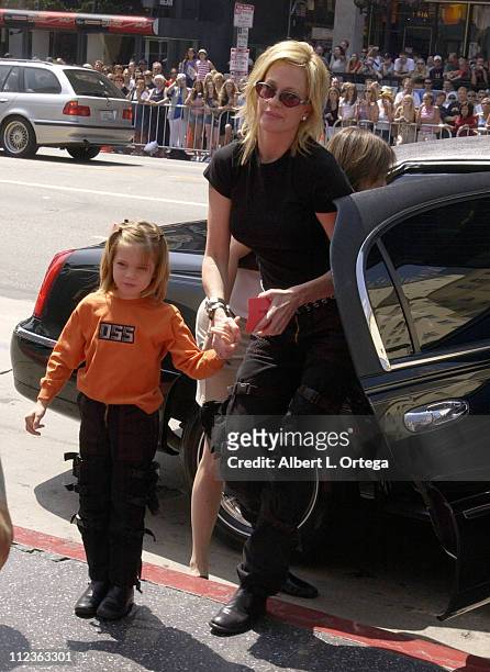 Melanie Griffith and daughter Stella during "Spy Kids 2: The Island Of Lost Dreams" Premiere at Grauman's Chinese Theatre in Hollywood, California,...