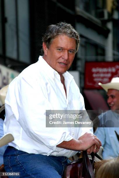 Tom Berenger during Tom Berenger and Burt Reynolds Wrangle Cattle in Times Square to Promote "Johnson County War" at Times Square in New York City,...