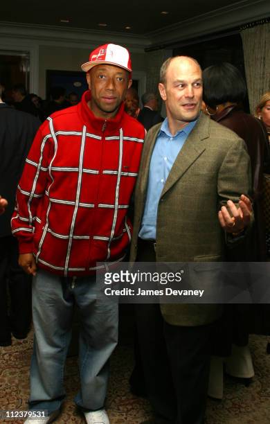 Russell Simmons and Barry Weiss during The Foundation for Ethnic Understanding Honors Jay-Z and Barry Weiss of Jive Records at Home of Denise Rich in...