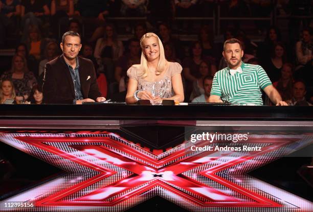 Jury members Till Broenner, Sarah Connor and DAS BO attend a photocall to promote the television music casting show X Factor at Arena Berlin on April...