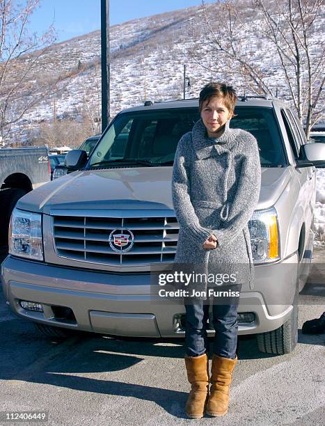 Maggie Gyllenhaal leaves in a Cadillac Escalade GSV.