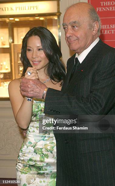 Lucy Liu and Mohamed Al Fayed, owner of Harrods during Lucy Liu Opens the Harrods January 2005 Sale, Two Percent of Earnings will be Donated to...