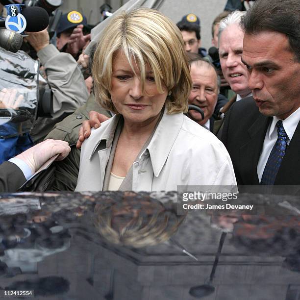 Martha Stewart leaves the Federal Court House in New York City after being indicted Wednesday with conspiracy and making false statements involving...
