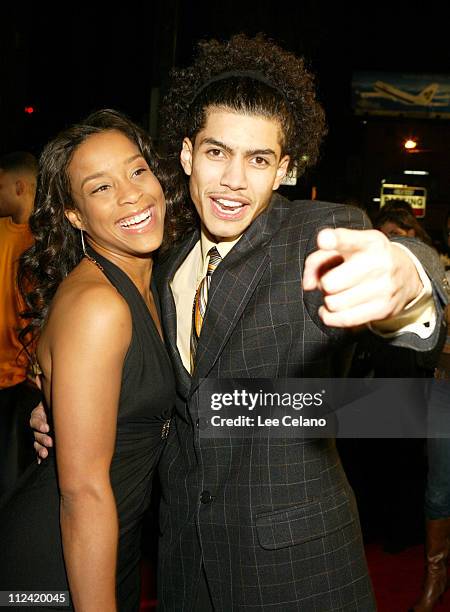 Rick Gonzalez and guest during "Coach Carter" Los Angeles Premiere - Red Carpet at Grauman's Chinese Theatre in Hollywood, California, United States.