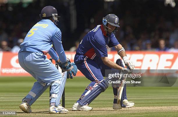 Nasser Hussain of England clocks up the runs during the match between England and India in the NatWest One Day Series Final at Lord's in London,...
