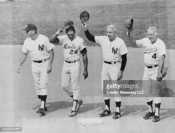 Major League Baseball's most famous centerfielders acknowledge the fans at Shea Stadium in Flushing, Queens, New York, on Old-Timers' Day on July 16,...