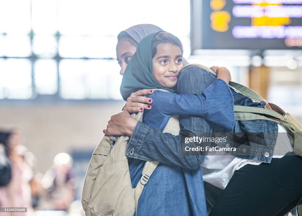 Mother And Daughter Hugging