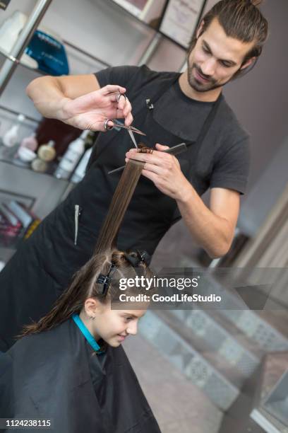 girl at a hair salon - cutting long hair stock pictures, royalty-free photos & images