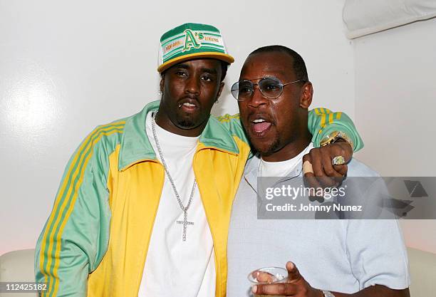 Sean "P. Diddy" Combs and Andre Harrell during Sean "P. Diddy" Combs' Fourth of July East Hampton Party at The Resort in East Hampton, New York,...