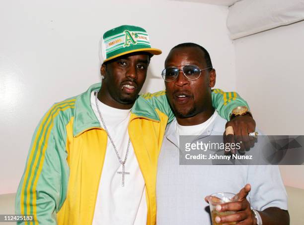 Sean "P. Diddy" Combs and Andre Harrell during Sean "P. Diddy" Combs' Fourth of July East Hampton Party at The Resort in East Hampton, New York,...
