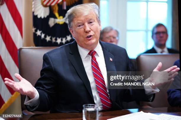 President Donald Trump speaks during a cabinet meeting in the Cabinet Room of the White House in Washington, DC on February 12, 2019. - US President...