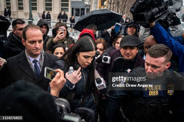 Emma Coronel Aispuro, wife of Joaquin "El Chapo" Guzman, is surrounded by security and members of the press as she exits the U.S. District Court for...