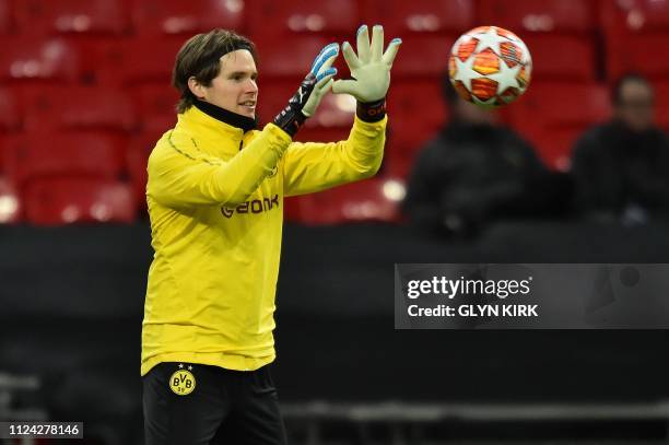 Dortmund's Swiss goalkeeper Marwin Hitz attends a training session at Wembley Stadium, north London, on February 12, 2019 on the eve of their UEFA...