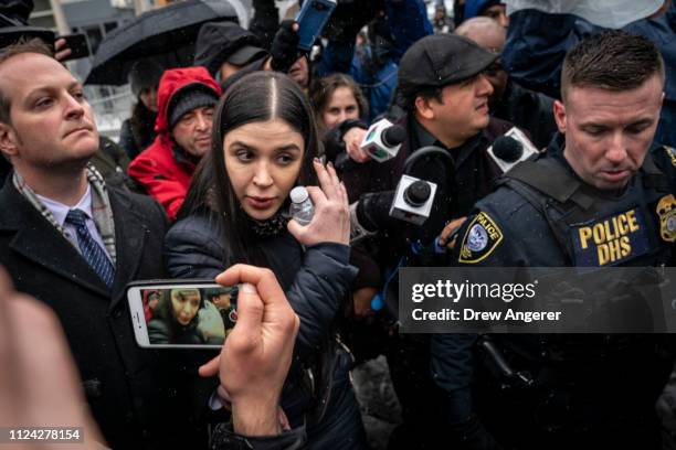 Emma Coronel Aispuro, wife of Joaquin "El Chapo" Guzman, is surrounded by security and members of the press as she exits the U.S. District Court for...