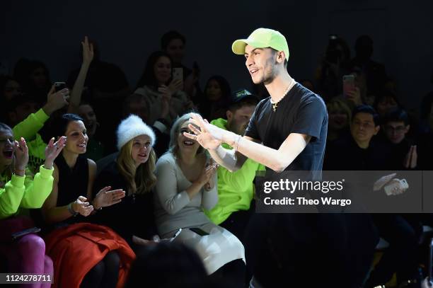 Designer Christian Cowan walks the runway at the Christian Cowan front row during New York Fashion Week: The Shows at Gallery II at Spring Studios on...