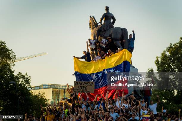 Thousands of protesters gather at Plaza Baquedano to demonstrate their support for opposition leader Juan Guaido as Venezuela's interim president...