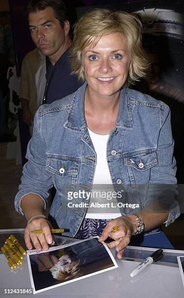 Amanda Tapping of "Stargate SG-1" signing autographs at the Sci-Fi Booth