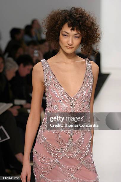 Ai Tominaga wearing Reem Acra Fall 2004 during Olympus Fashion Week Fall 2004 - Reem Acra - Runway at The Atelier at Bryant Park in New York City,...