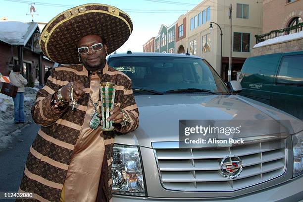 Archbishop Don Magic Juan with the Cadillac Escalade E5V