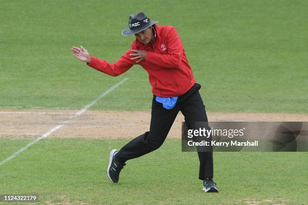 Match official Billy Bowden signals 4 runs during game one of the One Day International Series between New Zealand White Ferns and India at McLean...